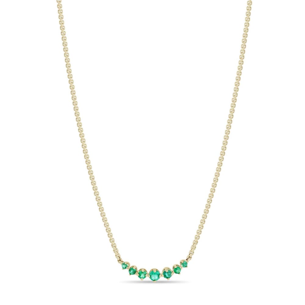 14K GOLD CURVE NECKLACE WITH 7 GRADUATED PRONG SET EMERALDS ON AN ADJUSTABLE 14-16" EXTRA SMALL BOX CHAIN