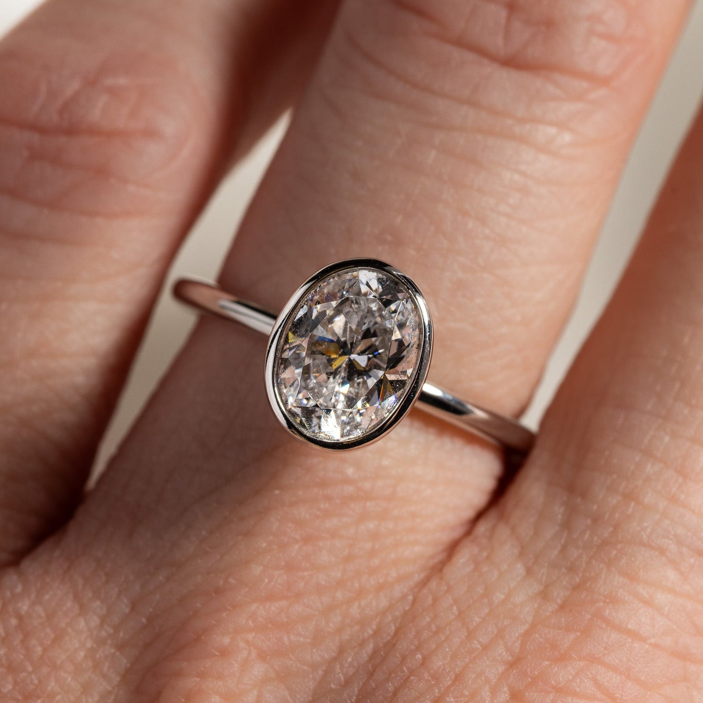 Sylvie Cliodhna Bezel Oval Solitaire Engagement Ring 18K White Gold