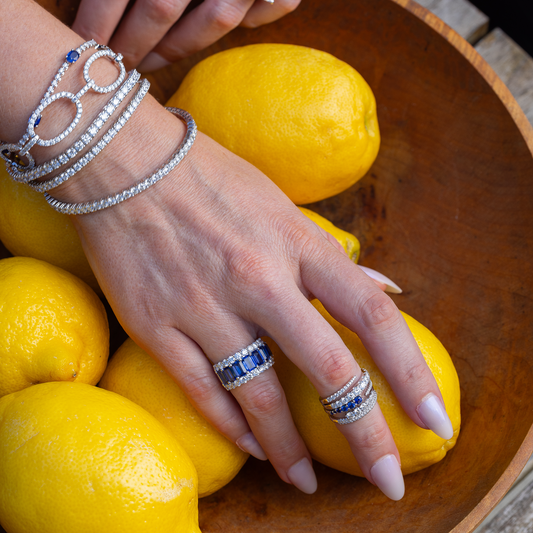 King Jewelers Diamond and Blue Sapphire Bypass Ring 14K White Gold