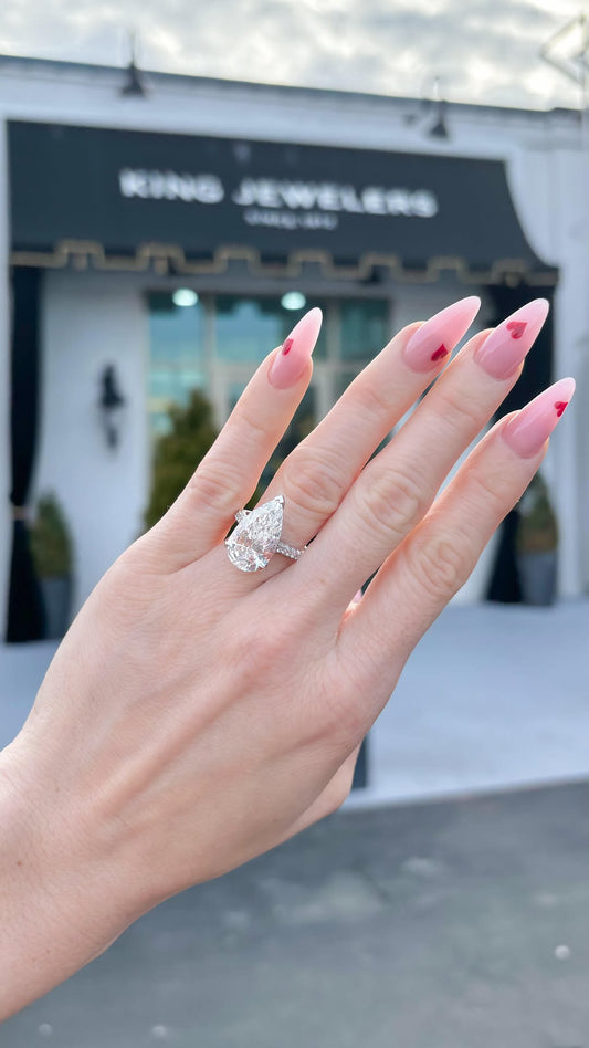 GIA diamond engagement ring on hand