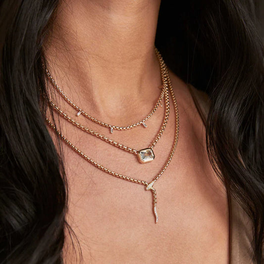 Zoe Chicco snake necklace on model