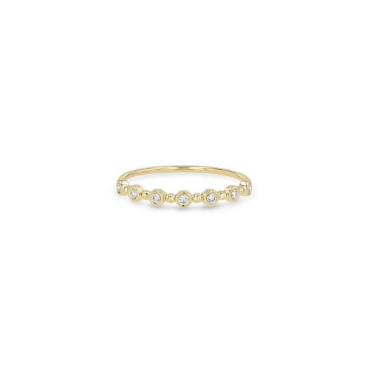 14K GOLD BEAD AND ROUND BEZEL RING WITH 7 1.5MM WHITE DIAMONDS ACROSS THE TOP (.11 CTW)