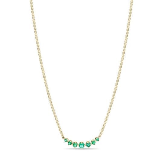 14K GOLD CURVE NECKLACE WITH 7 GRADUATED PRONG SET EMERALDS ON AN ADJUSTABLE 14-16" EXTRA SMALL BOX CHAIN