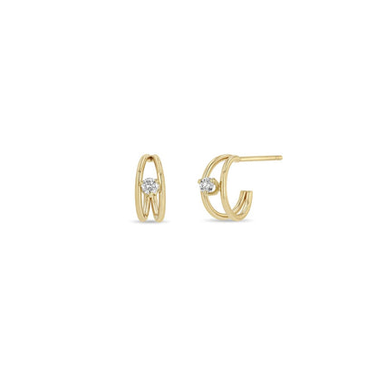 14K GOLD HUGGIE DOUBLE WIRE HOOPS WITH A PRONG SET 2.4MM WHITE DIAMOND IN BETWEEN THE HOOPS (.10 CTW)