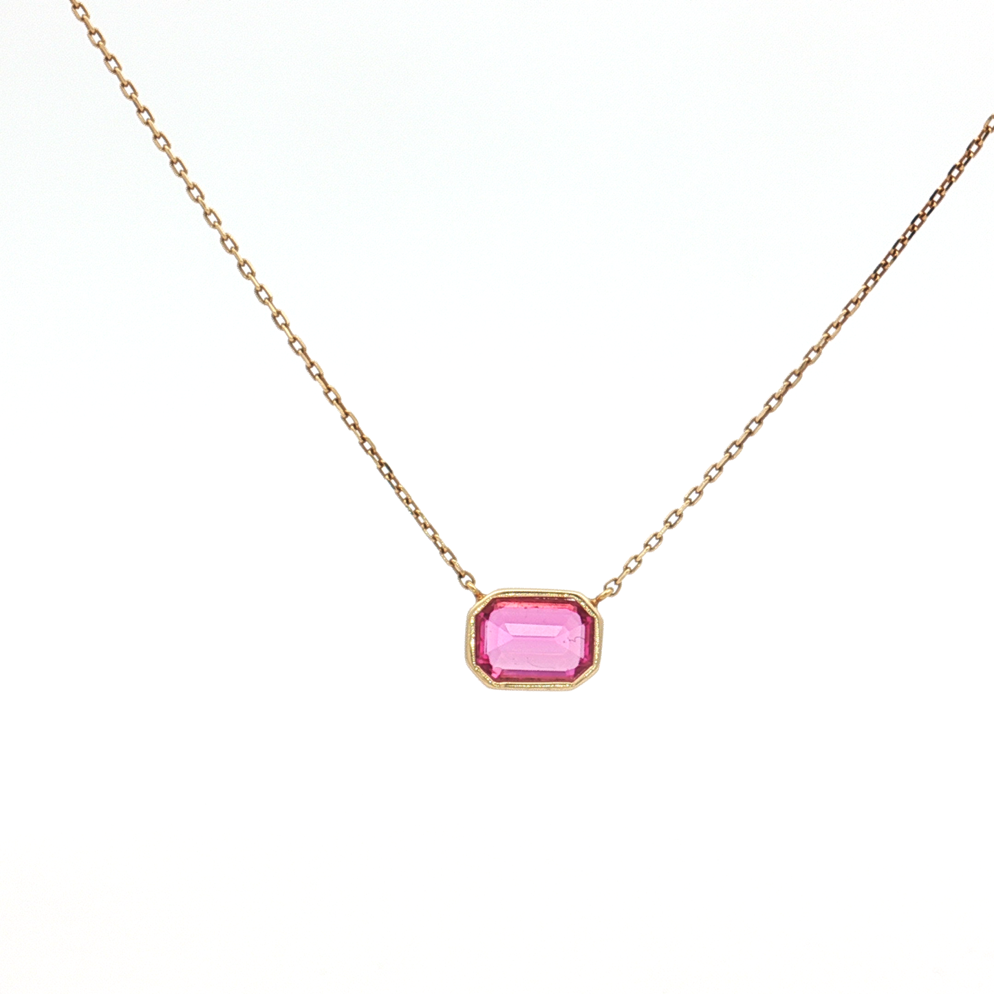King Jewelers 1.13ct Emerald Cut Pink Sapphire Pendant Necklace 14K Yellow Gold