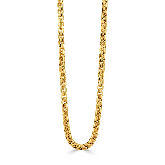 A gold-toned metal chain necklace with a curb-style link pattern, shown hanging vertically against a plain white background.